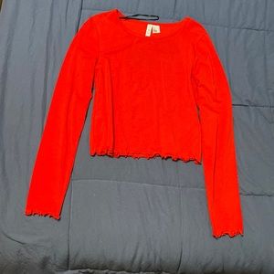 Red long sleeve crop top with ruffled edges